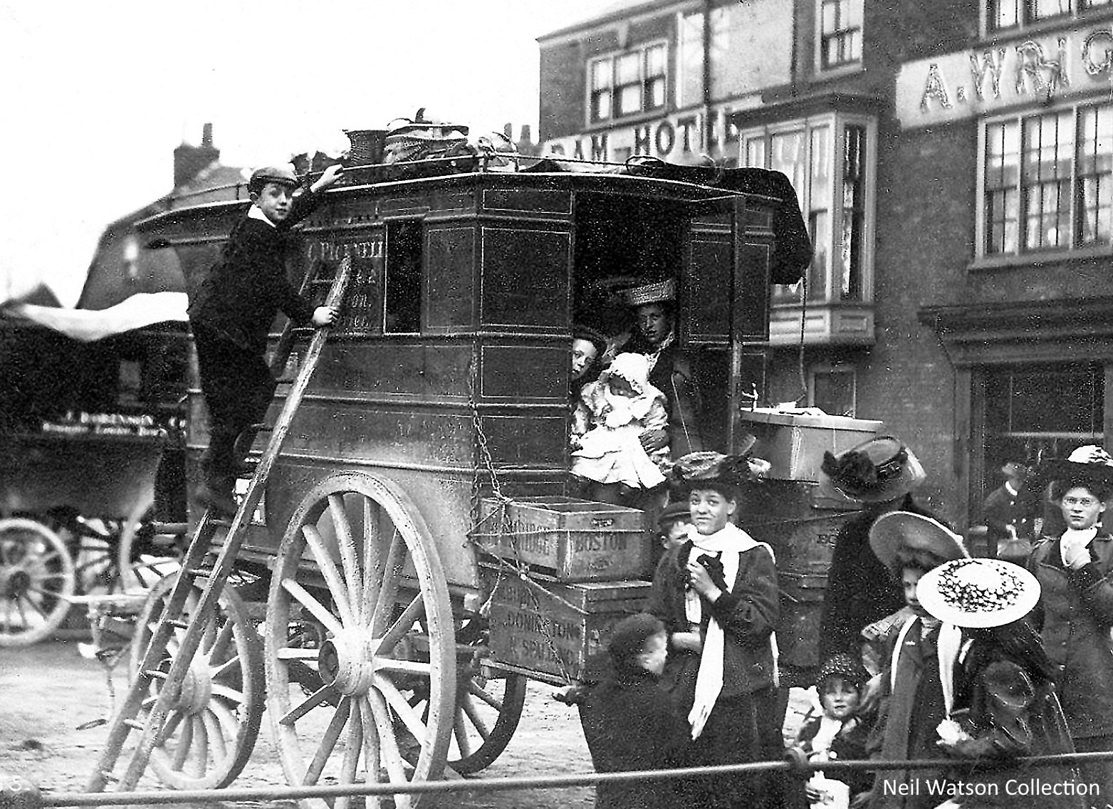 Old Stage coach wagon and passangers outside the ram hotel