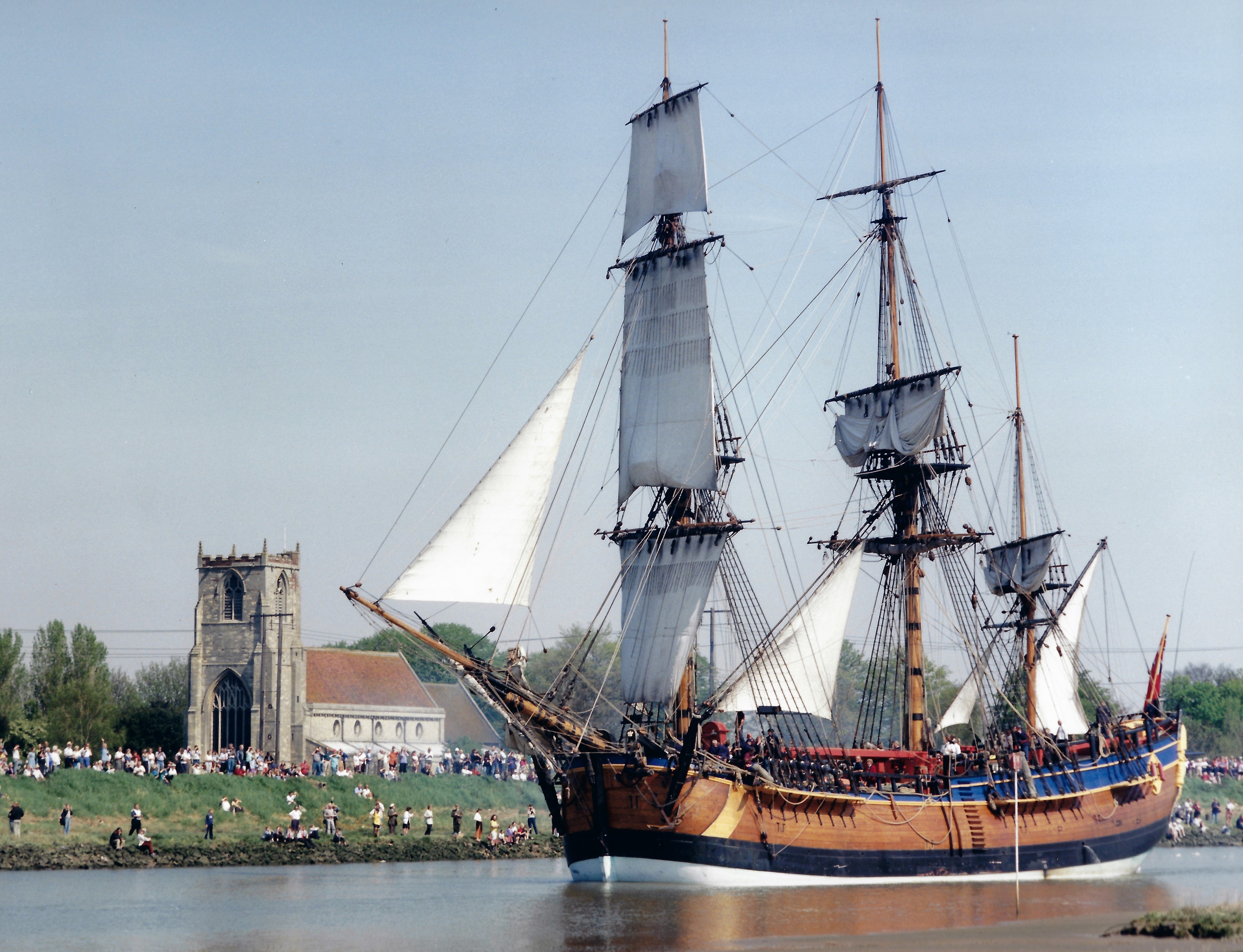 The Replica of Cook's Endeaour passing Skirbeck Church